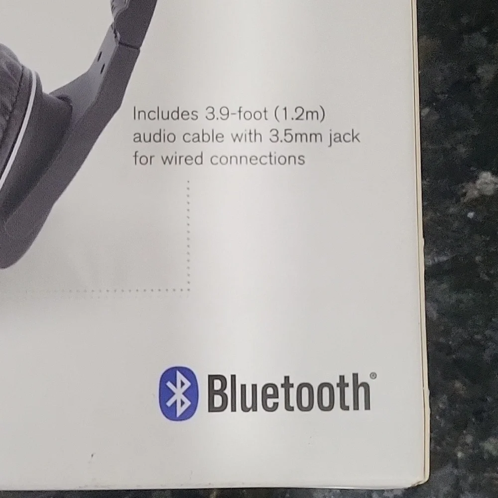 NIB Brookstone Black Compact Wireless Headphones